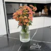تصویر کوچک گلدان شفاف شیشه ای طرح خط دار