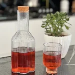 تصویر کوچک بطری و لیوان سلنا تیدا